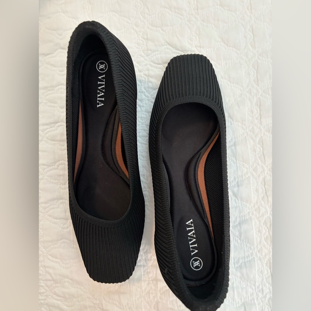 VIVAIA black chunky square toe heels.